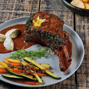 Pork Tomahawk with Mole Sauce